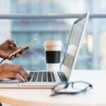 Free laptop on table top stock photo